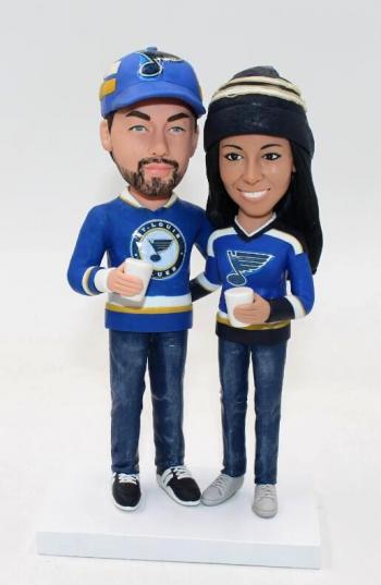 Sports themed couple bobbleheads