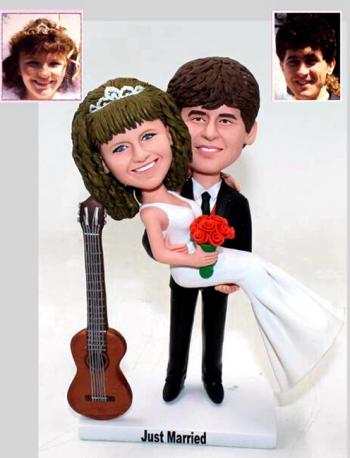 Custom wedding cake topper bride holding groom