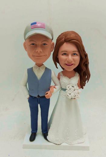 Custom bobblehead-wedding cake topper