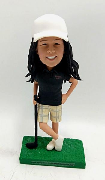Custom bobblehead-playing golf