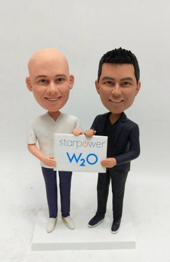 Custom bobbleheads-double person holding a sign