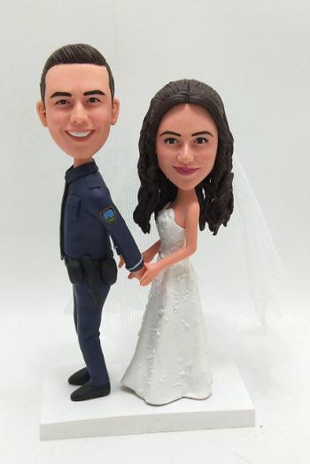 Custom wedding cake topper police under arrest