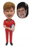 Custom bobblehead doctor in red scrubs