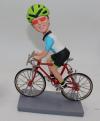 Custom bobblehead riding bike